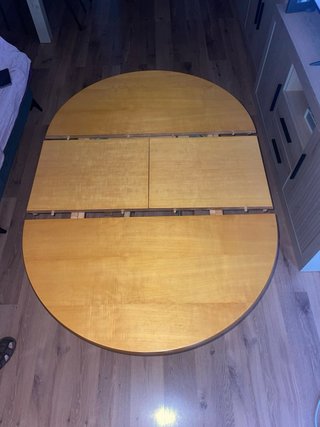 Mesa de comedor redonda de madera