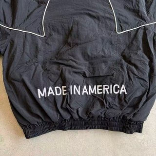 Chaqueta Marty Supreme Negra con Estrellas Naranja