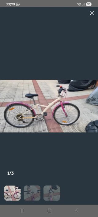 Bicicleta infantil rosa y blanca