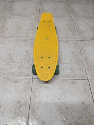 Monopatín amarillo Penny Board