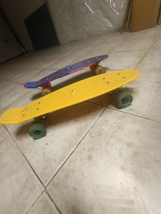 Monopatín amarillo Penny Board