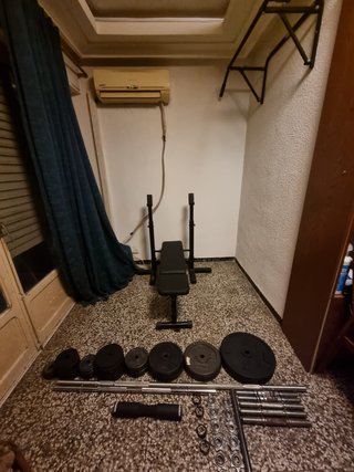Lote Gimnasio 123kg Disco + Banco + Barra Dominada