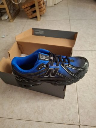 Zapatillas New Balance Negras y Azules