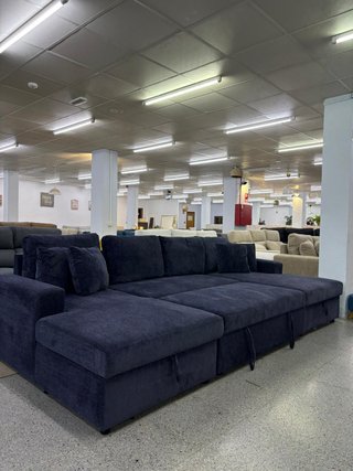Sofá modular azul oscuro en U