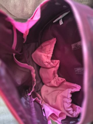 Bolso de mano y hombro rosa y fucsia