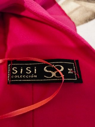 Camisa rosa con volantes