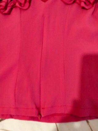 Camisa rosa con volantes