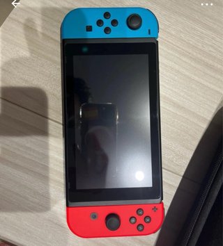 Nintendo Switch + Mando Pro + Juegos