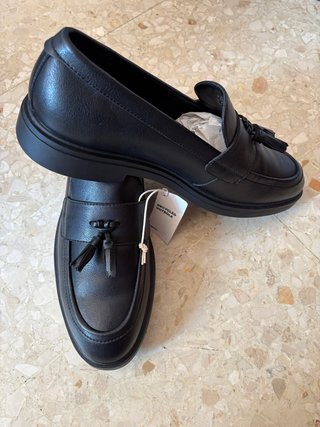 Mocasines negros con flecos