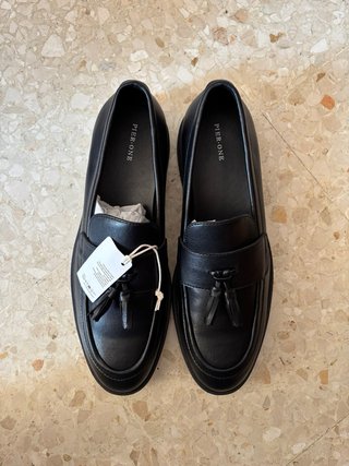 Mocasines negros con flecos