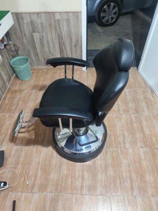 Sillón de peluquería negro