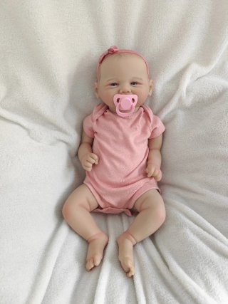 Bebé Reborn realista con chupete