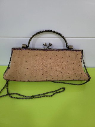 Bolso de mano floral con pedrería