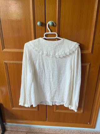 Blusa blanca elegante de zara