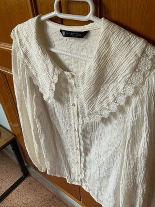 Blusa blanca elegante de zara