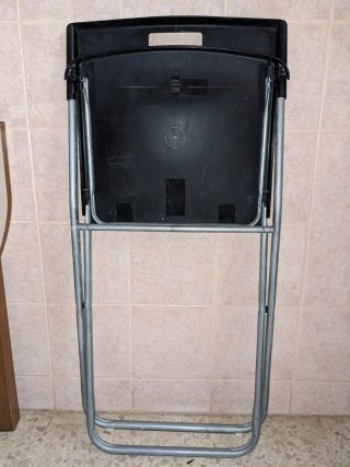 Silla Plegable metálica. Negra y Plateada