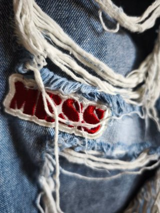 Jeans strappati con patch