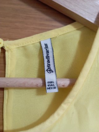 Camiseta sin mangas amarilla mujer
