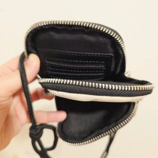 Bolso Parfois portatelefono blanco y negro