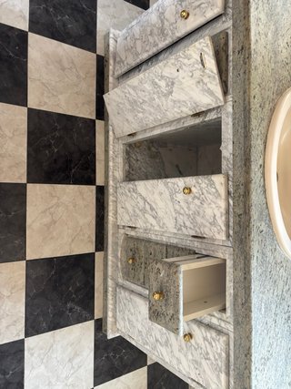 Mueble de baño mármol y granito.