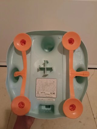 Asiento de ducha para bebé con juguetes