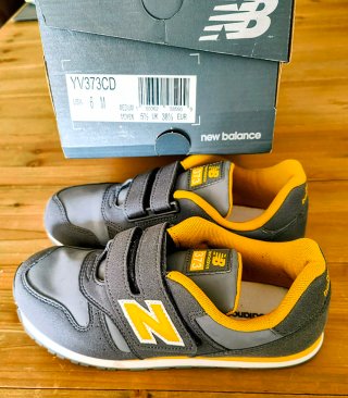 Zapatillas New Balance niño 373 gris/amarillo