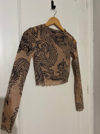 Top negro encaje efecto piel