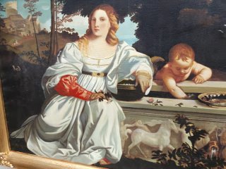 Stampa con cornice dorata lavorata