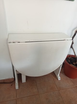 Mesa ovalada blanca extensible
