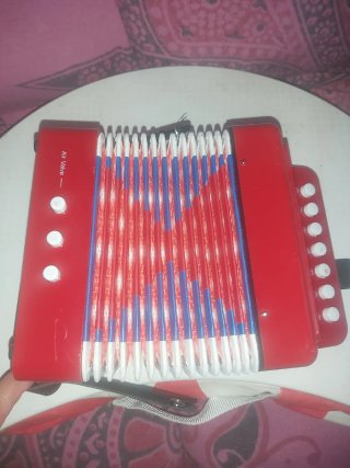Acordeón Infantil Rojo,en perfecto estado.