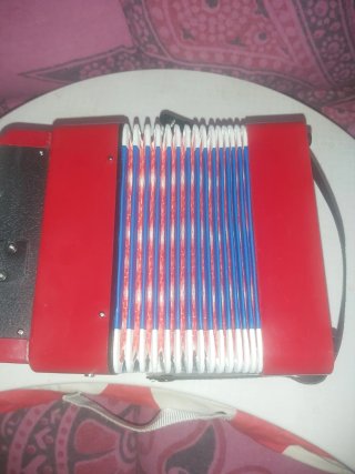 Acordeón Infantil Rojo,en perfecto estado.