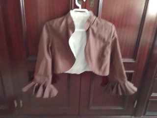 Traje de flamenca marrón.