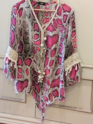 Blusa animal print fucsia talla L