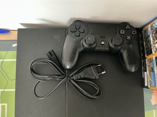 PS4 Negra con 11 Juegos
