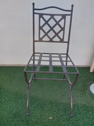 Seis sillas de hierro fundido para terraza