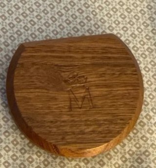 Estuche de madera para monedas