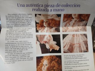 Muñeca de porcelana vintage con vestido rosa