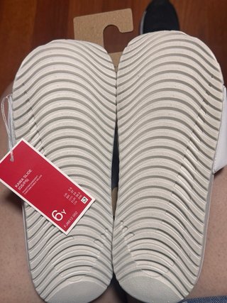 Chanclas Nike Blancas y Doradas