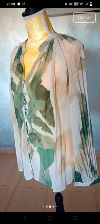 Blusa elegante plisada 40/42