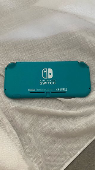 Nintendo Switch Lite Celeste + Custodia e Caricatore
