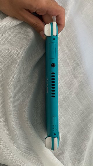 Nintendo Switch Lite Celeste + Custodia e Caricatore
