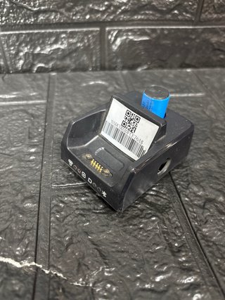 Escáner de dedo con base de carga