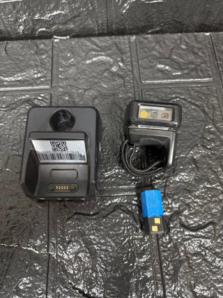 Escáner de dedo con base de carga