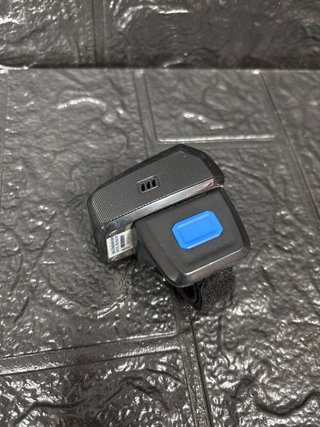 Escáner de dedo con base de carga