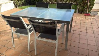 Mesa cristal y 4 sillas exterior