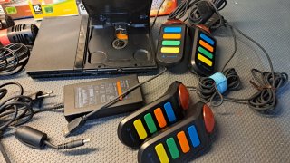 Playstation 2 Slim + 2 Micros + Buzz