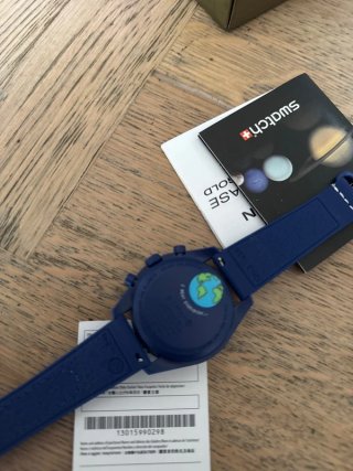 Swatch x Omega Speedmaster Snoopy
