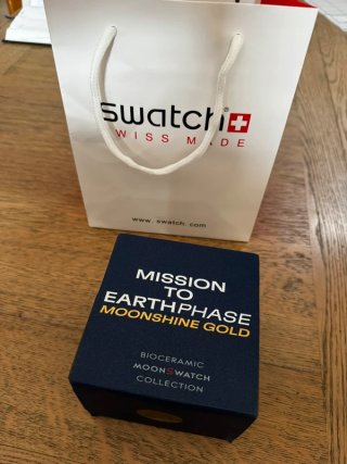 Swatch x Omega Speedmaster Snoopy