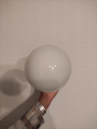 Pareja aplique brazo detalle vegetal y bola blanca