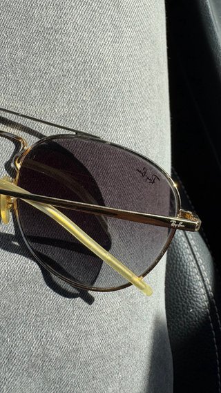 Gafas de sol Ray-Ban aviador negras y doradas
